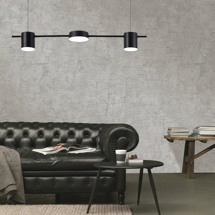 Designer black drum pendant light, sleek aluminium, for contemporary interior design.