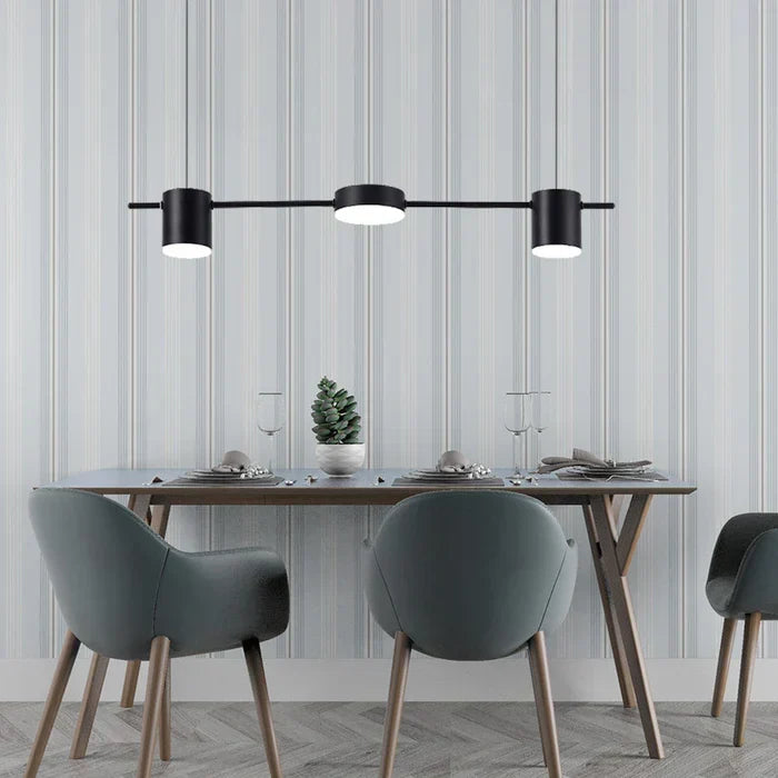 Contemporary black aluminium pendant, drum style, a focal point for modern homes.