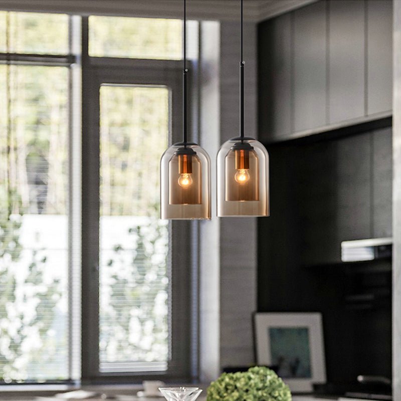 Elegant modern double glass pendant light, perfect contemporary lighting for dining rooms.