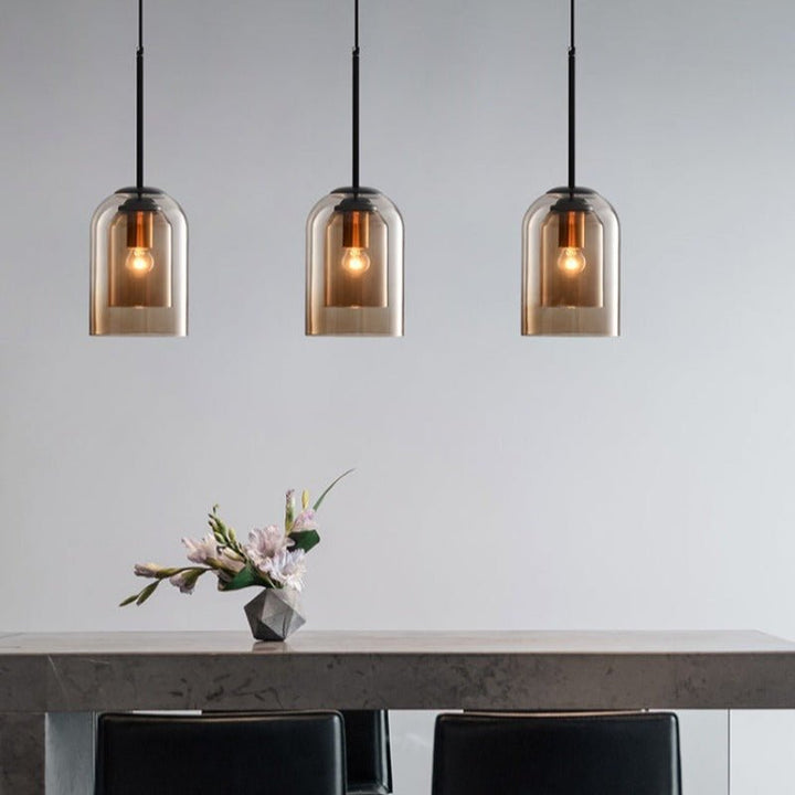 Adjustable height modern double glass pendant lamp, elegant contemporary design, perfect for any room.