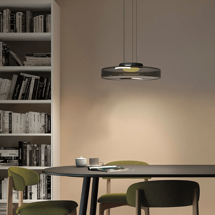 Modern Bauhaus pendant lamp. Glass fixture adding a unique touch to kitchen lighting.