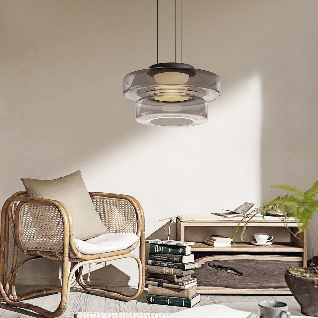 Bauhaus style glass pendant light. Modern adjustable lamp for versatile home illumination.