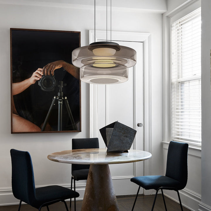 Unique AuroraSphere glass ceiling fixture. LED pendant for modern living room ambiance.