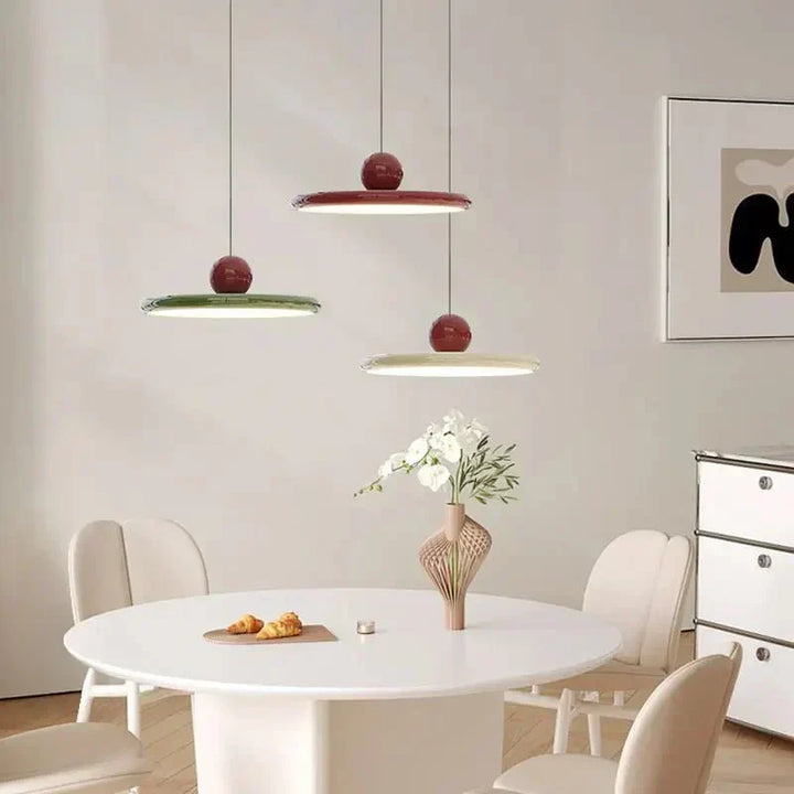 Elegant glass pendant light, inspired by Bauhaus design. Modern LED fixture for home, office or restaurant.