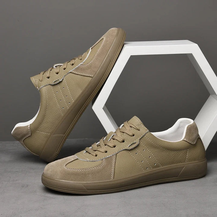 Khaki men's modern sneakers. Comfortable everyday footwear with a stylish, versatile design for walking.