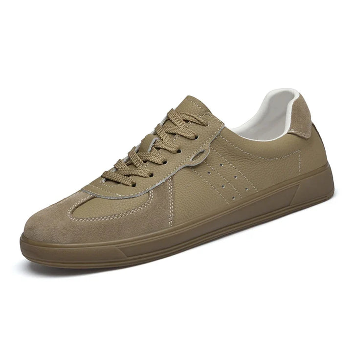 Stylish beige men's casual sneakers. Modern everyday footwear for comfortable walking & versatile fashion.