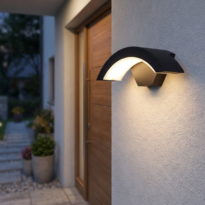 Modern black LED outdoor wall sconce, weatherproof architectural lighting for patio or garden.