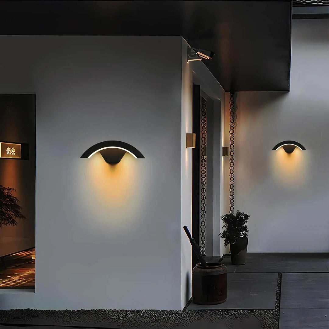 Architectural outdoor LED wall light, 'Glowwave' model, ideal for modern home exteriors.