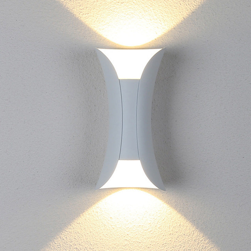 White modern LED garden wall light, weatherproof, energy-efficient exterior decor.
