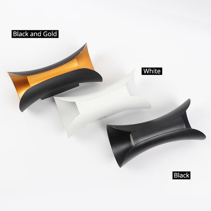 Modern white exterior LED light fixture, weatherproof, for patio and garden illumination.
