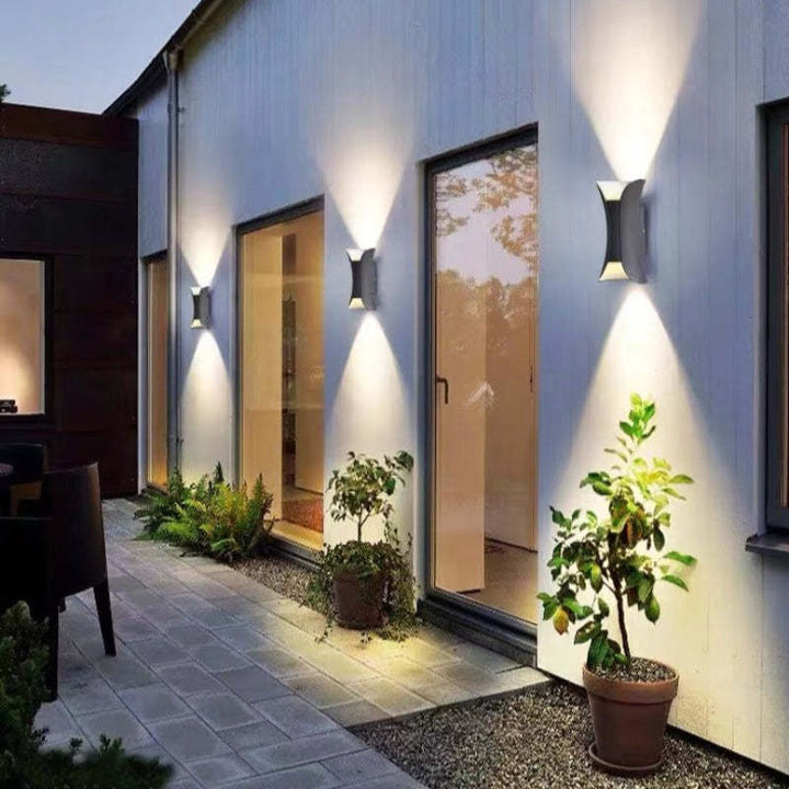 Adjustable modern outdoor LED wall light, black, energy-efficient for home decor.