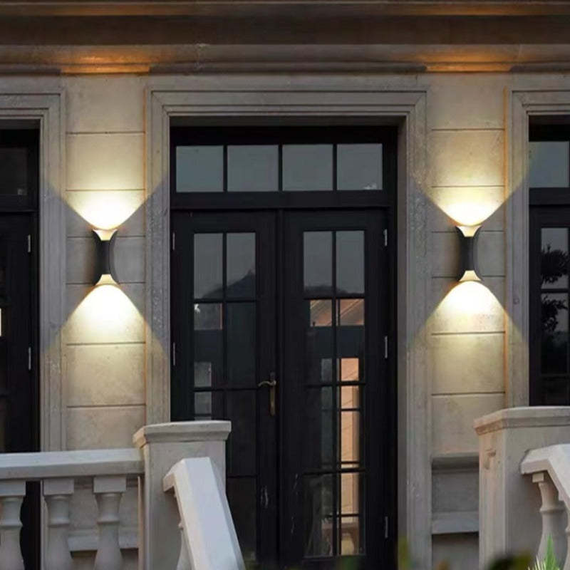 Black modern LED exterior light fixture, ideal for garden & patio ambient lighting.