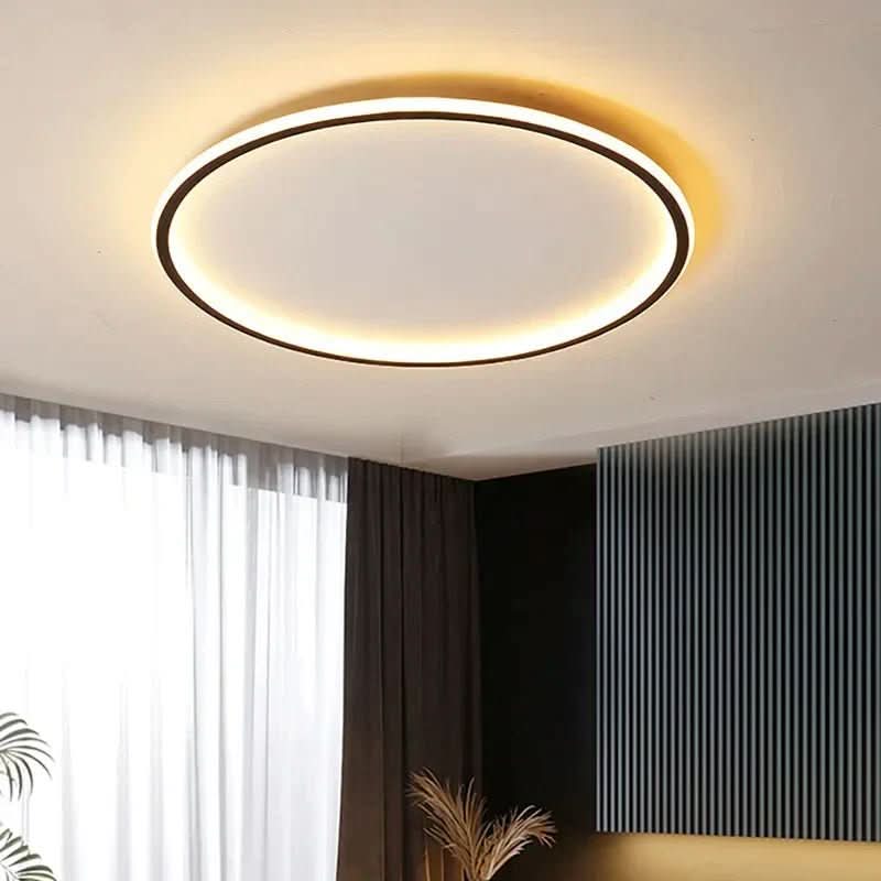 Modern black Scandinavian LED ceiling light. Ideal for living room or bedroom ambient lighting.