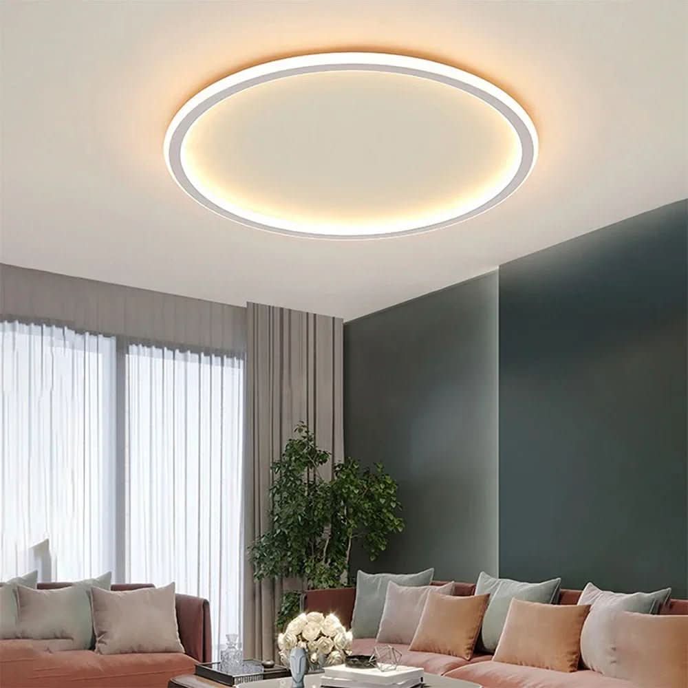 Dimmable white Scandinavian LED ceiling light. Provides warm, glare-free illumination for home decor.