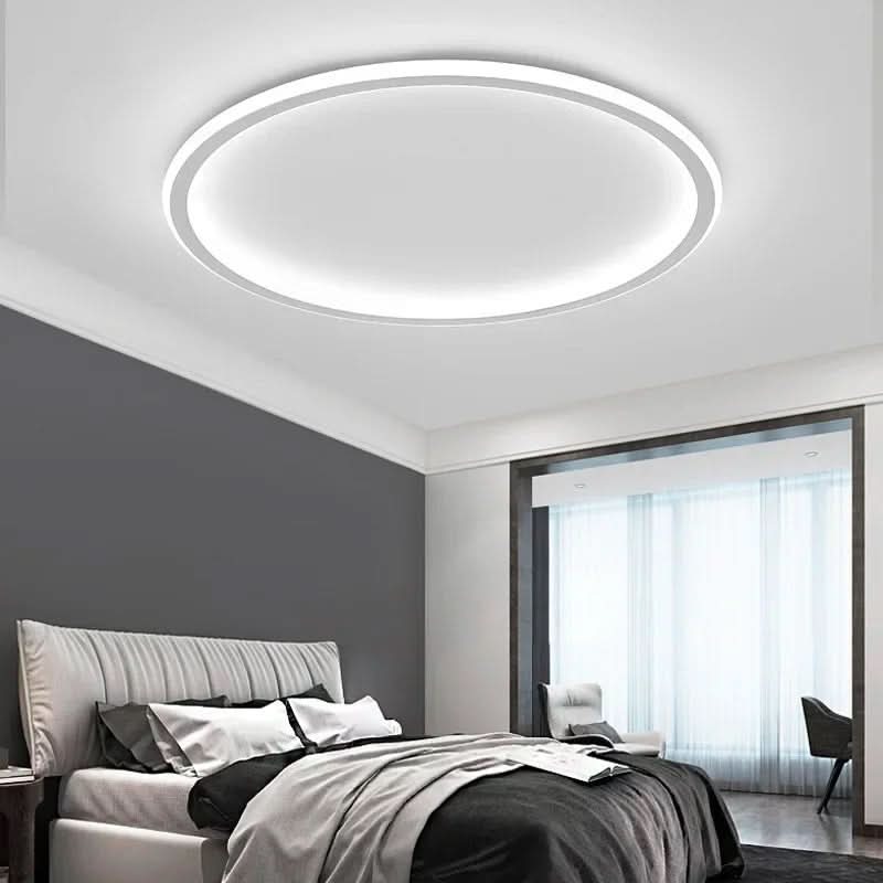 Contemporary Scandinavian LED ceiling light. Offers soft, warm, glare-free glow for modern rooms.