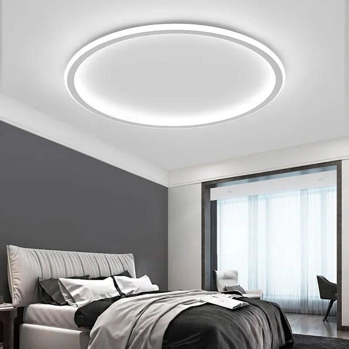 Contemporary Scandinavian LED ceiling light. Offers soft, warm, glare-free glow for modern rooms.
