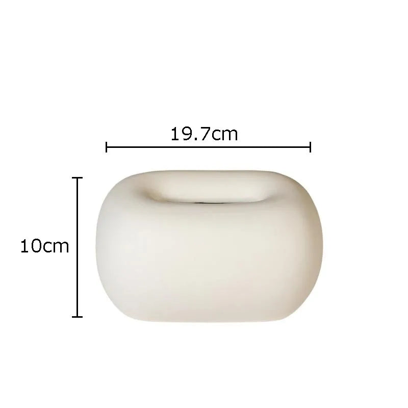 Stylish modern ceramic tissue box for elegant home decor. A decorative and minimalist accessory for any room.
