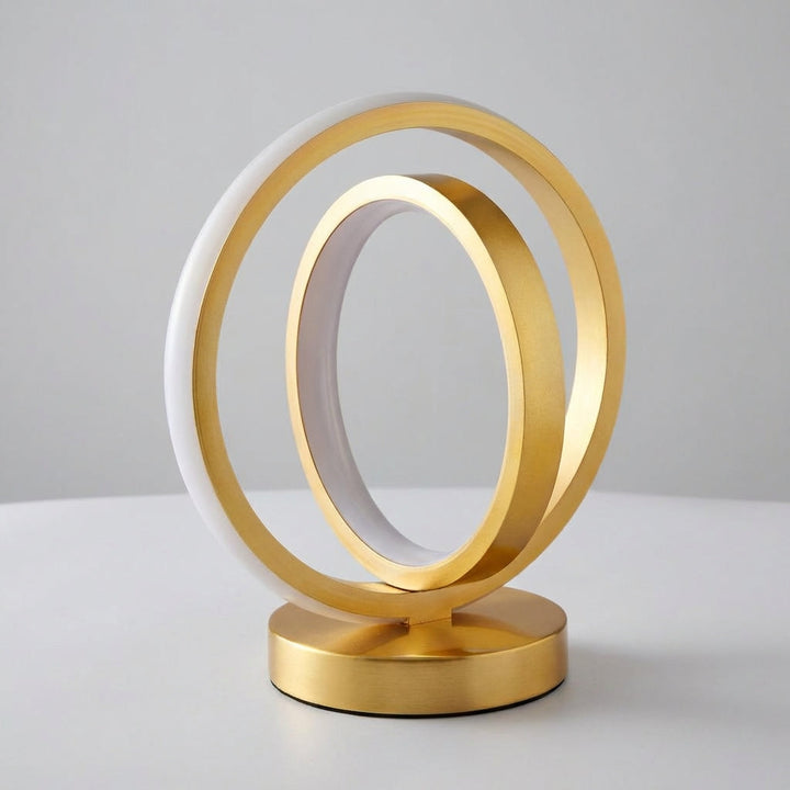 AuraLoop dimmable USB powered circular accent lamp on a bedside table, modern design
