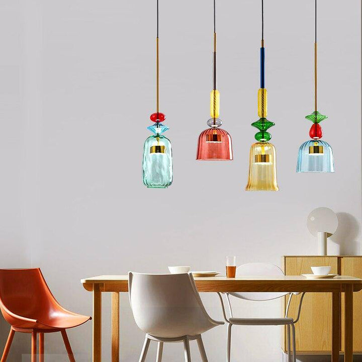 Elegant colored glass pendant light, modern LED ceiling lamp for dining room lighting.