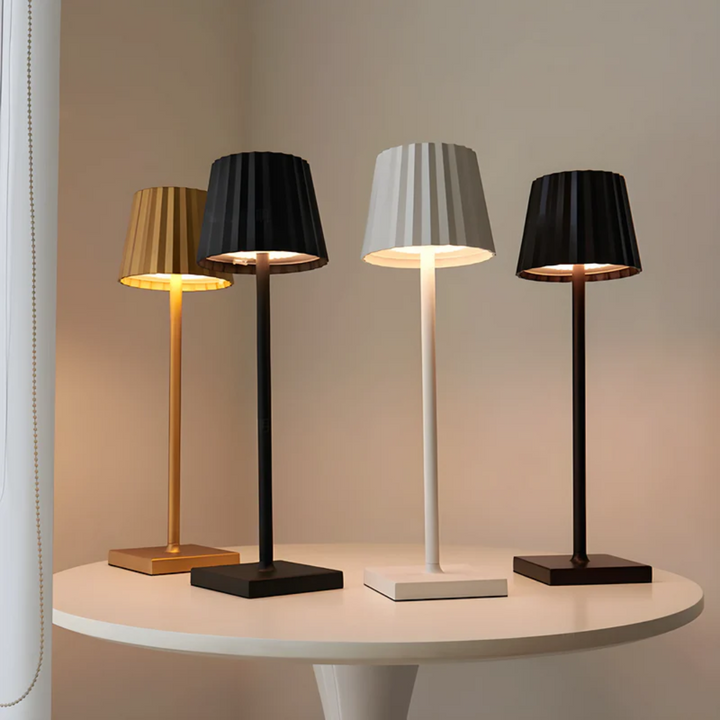 Create ambiance with this dimmable cordless touch lamp, portable LED, modern design for various settings.