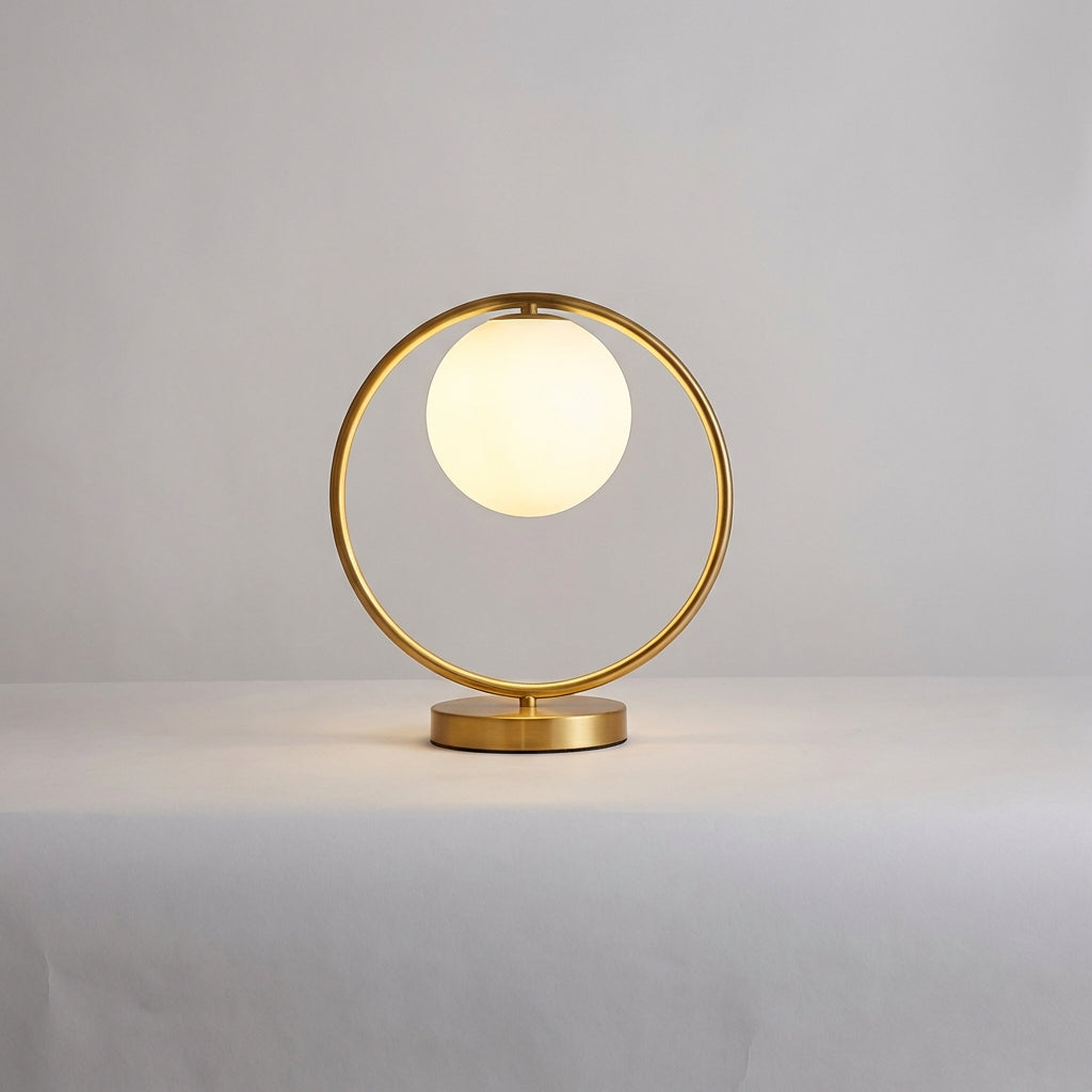 Desktop LED ring lamp, Orbella, with dimmable feature, providing stylish and functional accent lighting.