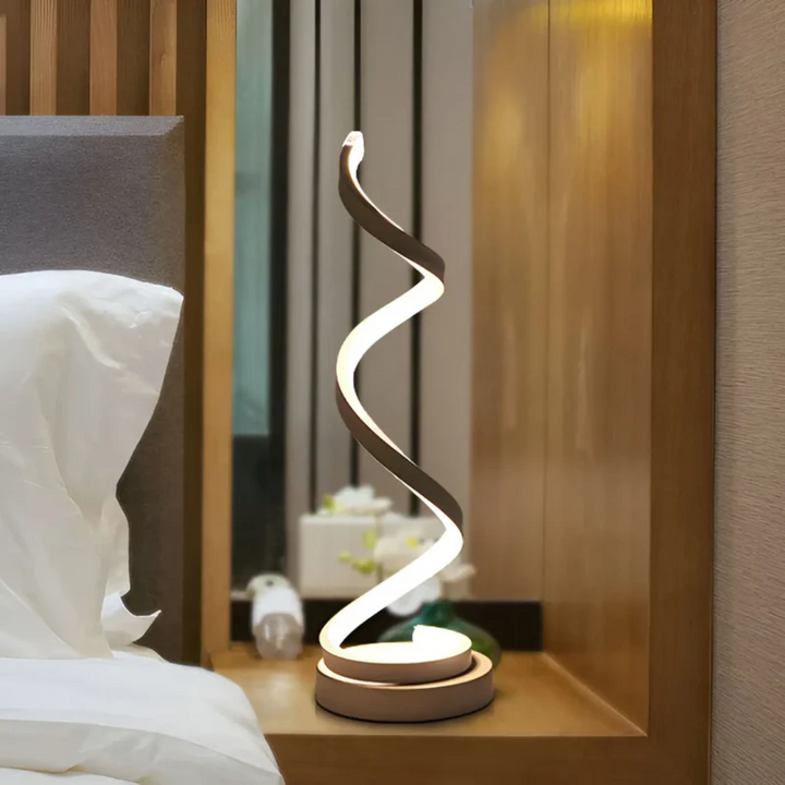 Stylish dimmable spiral LED lamp, providing targeted illumination for reading or decor