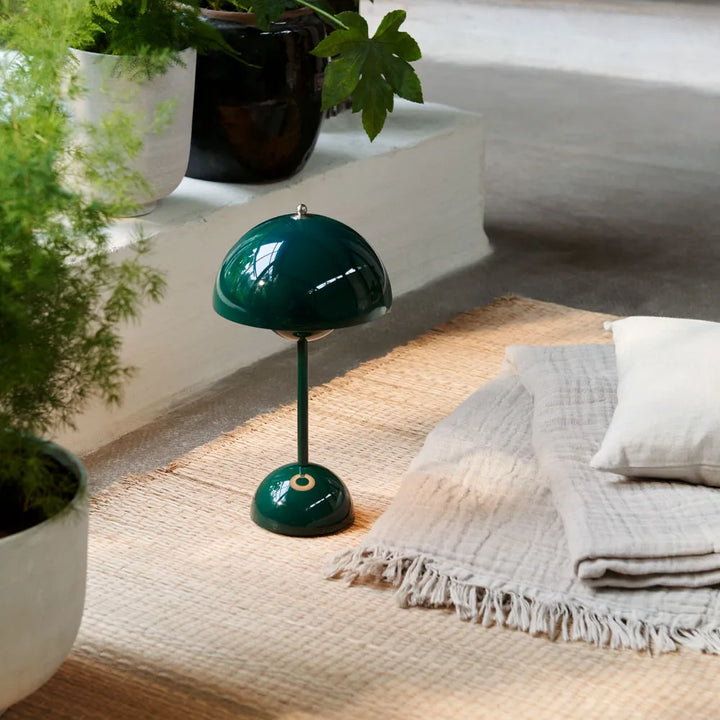 Portable wireless LED table lamp. Dimmable ambient lighting for bedroom, living room, or any modern home decor.