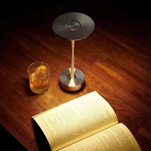 Waterproof dimmable wireless table lamp, portable & rechargeable LED light for modern homes.