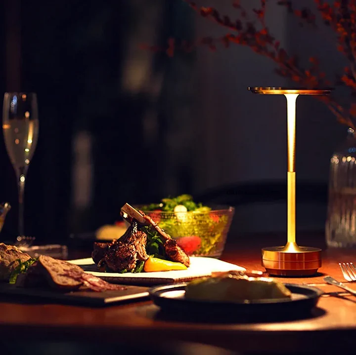 Stylish dimmable wireless desk lamp, rechargeable & waterproof, for versatile indoor/outdoor lighting.