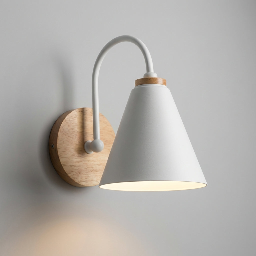 AureliaLamp downward cone shade wall sconce, a contemporary indoor light fixture with a matte black finish.