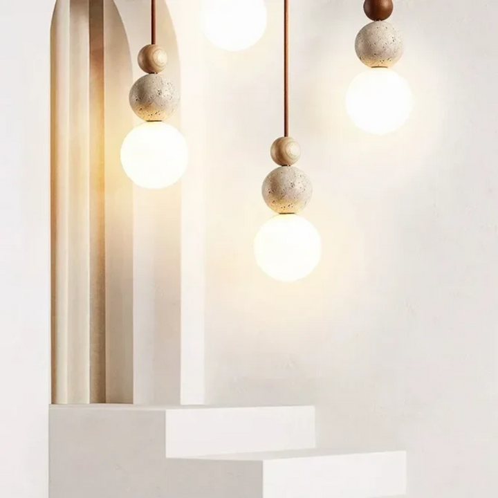 NaturaLuxe contemporary pendant light with travertine & mahogany, complements modern interior design.