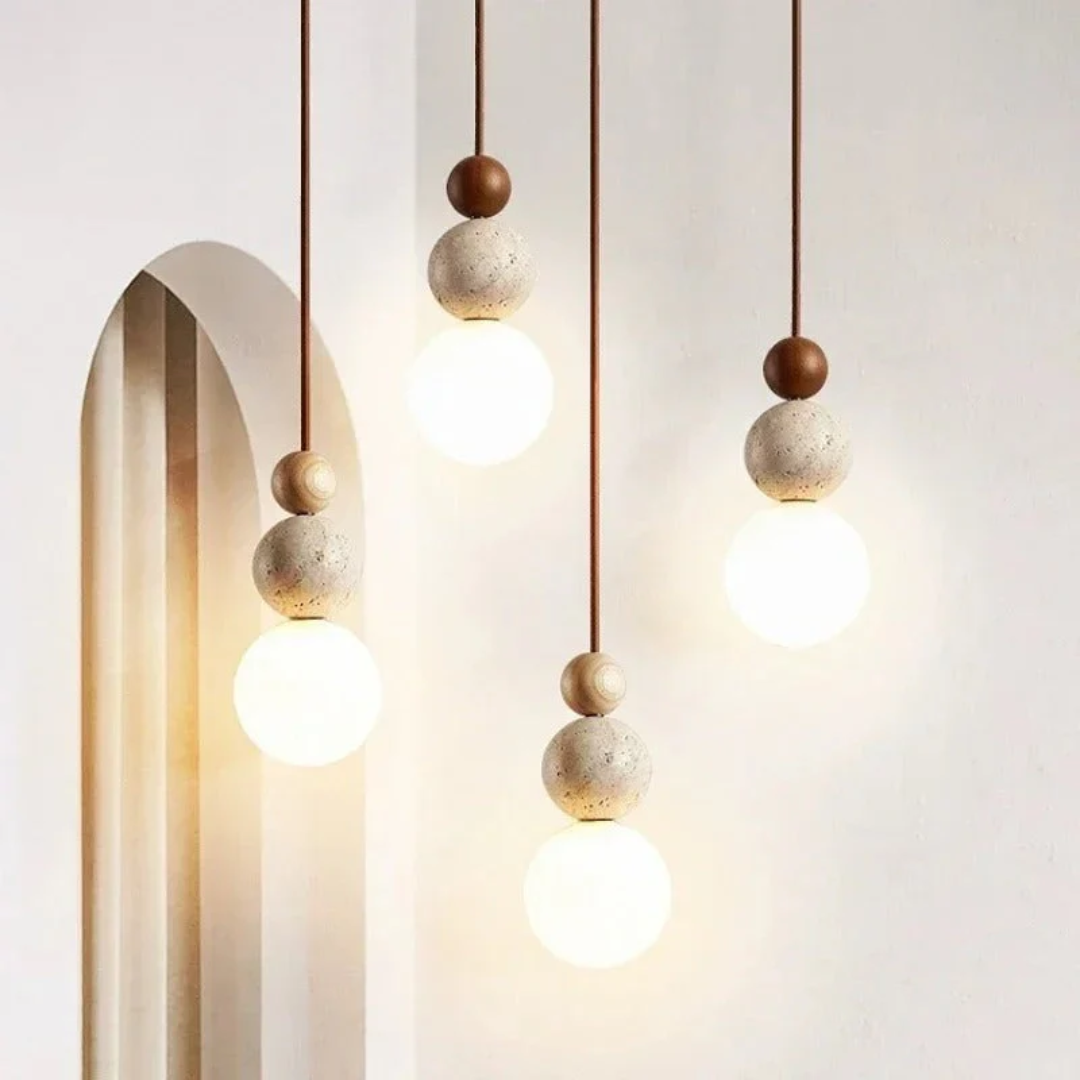 Sleek modern pendant lamp, unique travertine & mahogany design, enhances contemporary home decor.