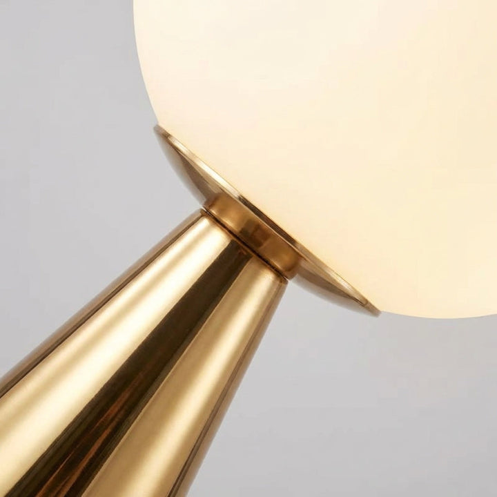 Ellarvo modern table lamp featuring a unique cone base and frosted glass for soft illumination