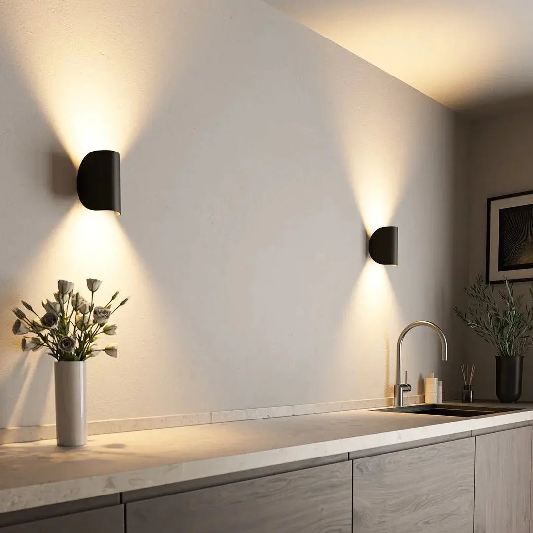 Modern, energy-efficient LED wall light for contemporary home decor, perfect for living rooms.