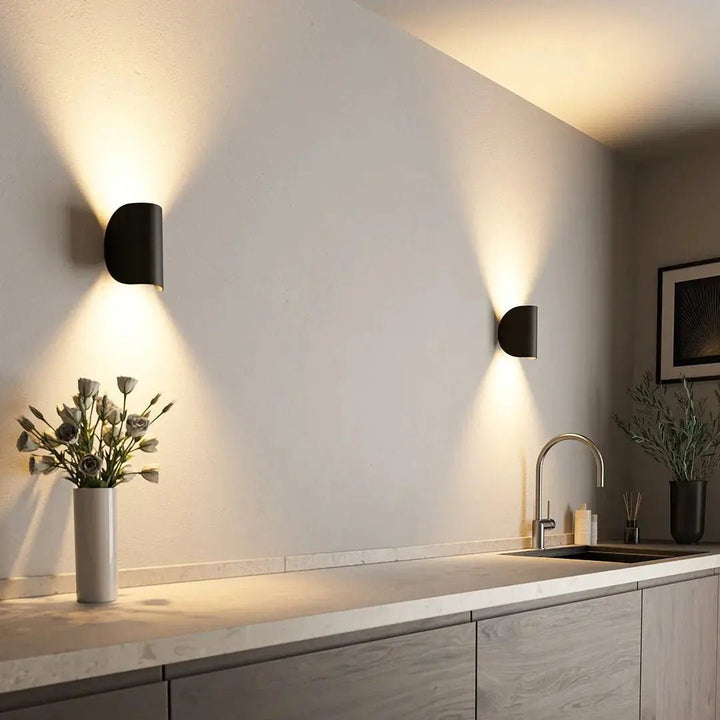 Modern, energy-efficient LED wall light for contemporary home decor, perfect for living rooms.