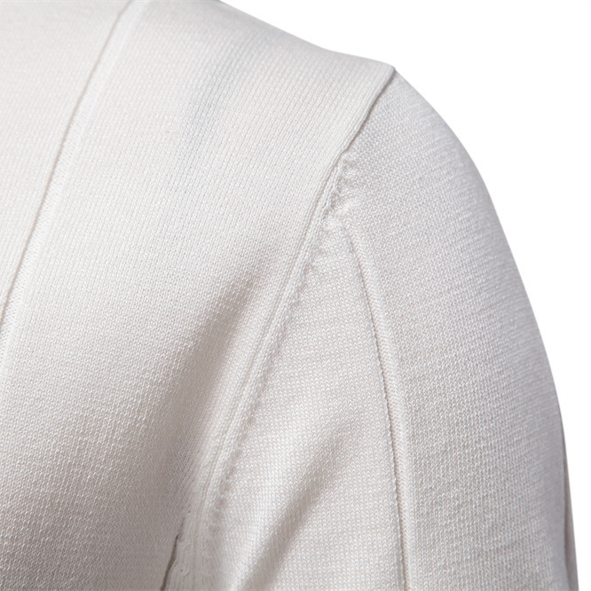 Close-up of the ribbed texture on a men's modern fit polo shirt with a sleek zip collar design.