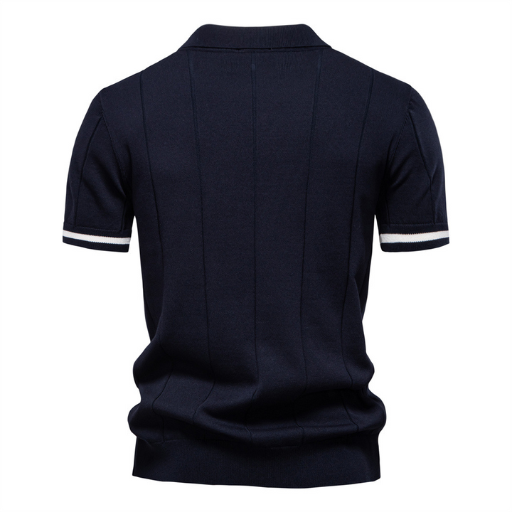 Back view of a fashionable men's short sleeve ribbed polo shirt, highlighting its modern fit design.