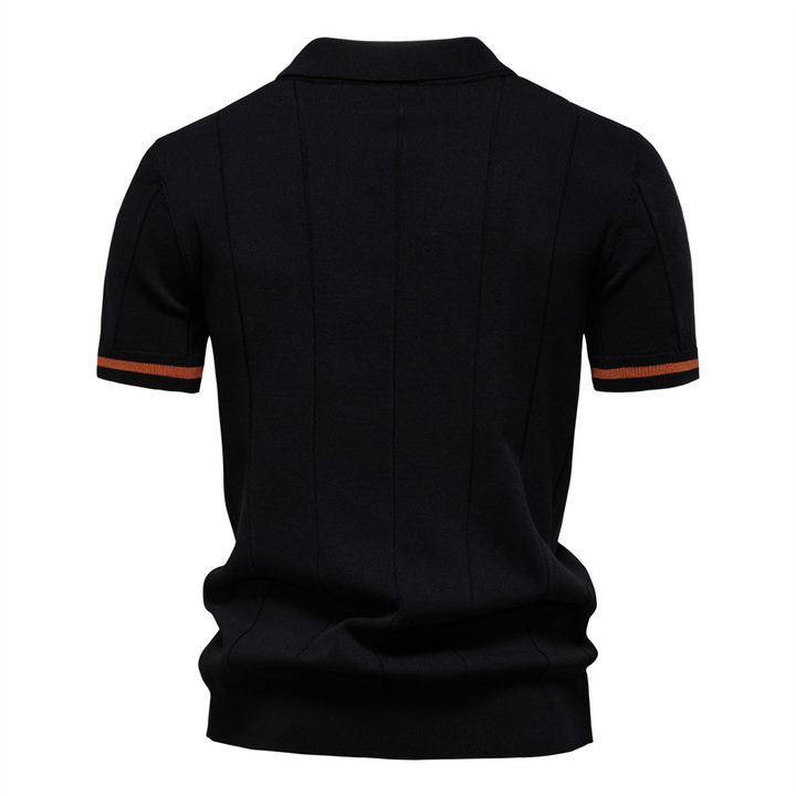 Detailed shot of the zip collar on a men's breathable ribbed polo shirt, ideal for summer fashion.