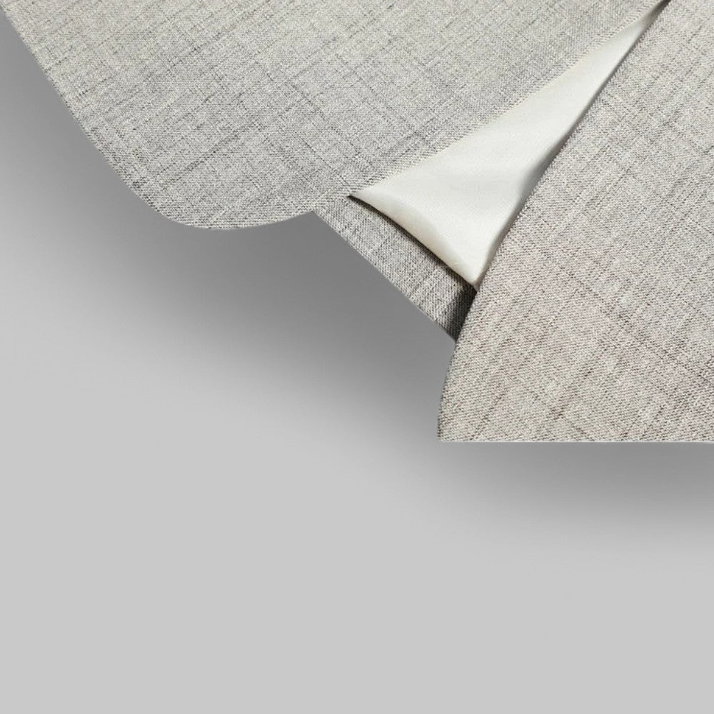 Men's modern fit two-button blazer styled for a smart business casual office outfit.