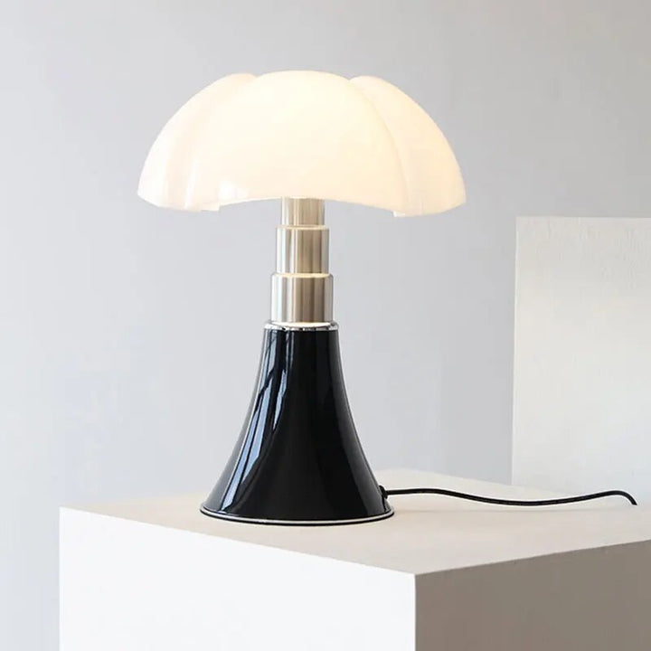 Soft glow dimmable LED flower table lamp, modern lighting providing ambient accent for home decor.