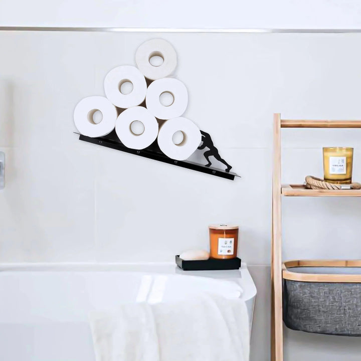 Sleek black iron freestanding toilet paper stand. Modern bathroom organizer with an extra storage shelf.