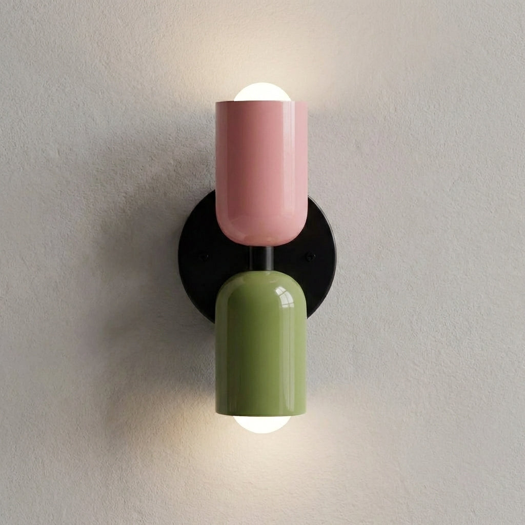 Decorative geometric wall sconce, metal & glass construction, enhancing any modern space