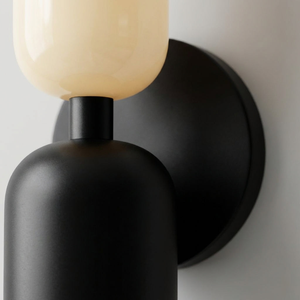 Stylish geometric wall sconce featuring a unique dual-tone shade, decorative modern lighting