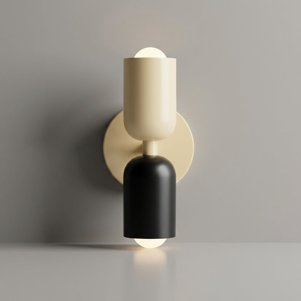 Close-up of geometric wall sconce, highlighting the dual-tone shade's metal and glass details