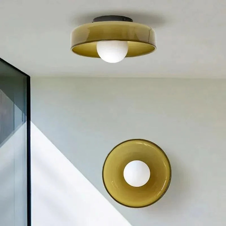 Clear glass ceiling light, a modern lighting solution for bedrooms or kitchens.