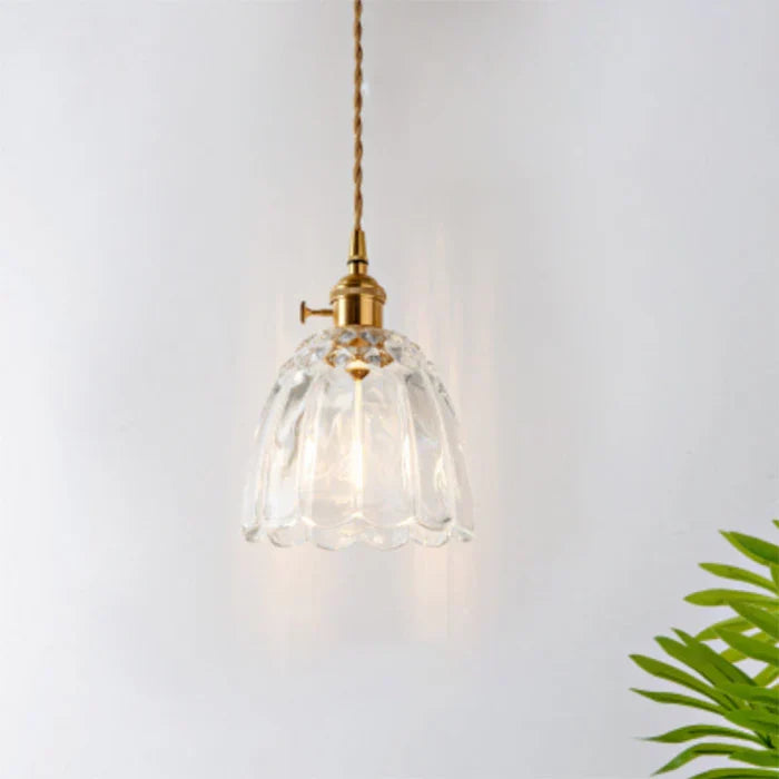 OpulentGlow modern glass pendant lamp, elegant transparent hanging light for luxurious dining.