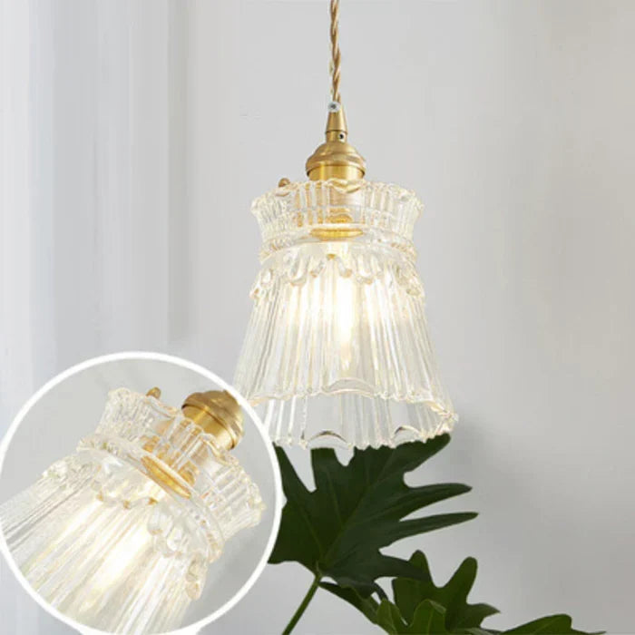 Modern transparent glass pendant lamp, elegant home decor lighting for dining room.