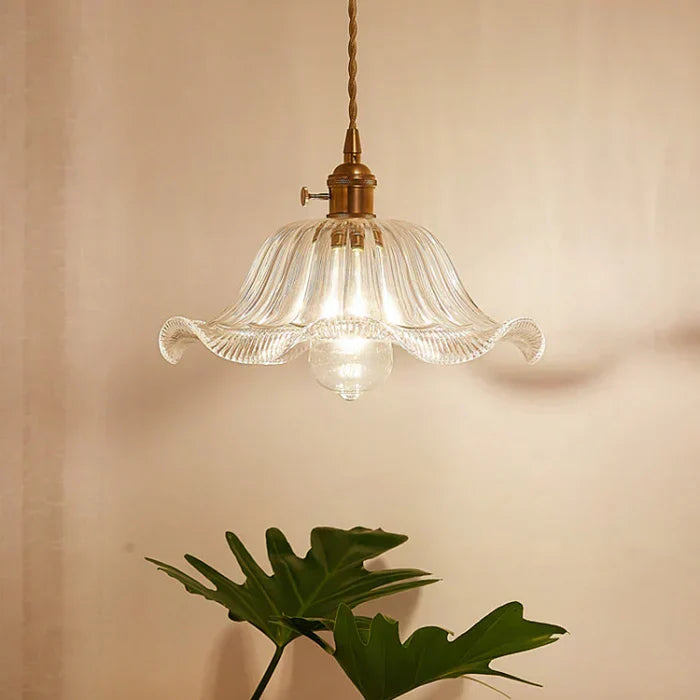 Modern glass pendant lamp, providing elegant ambient lighting for dining room home decor.