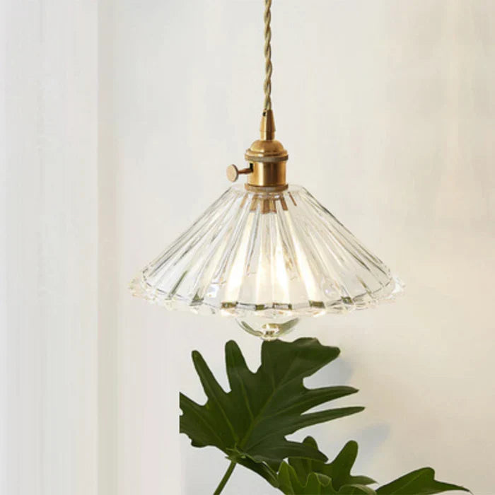 Dining room glass pendant lamp, a modern hanging light for elegant home ambiance & style.