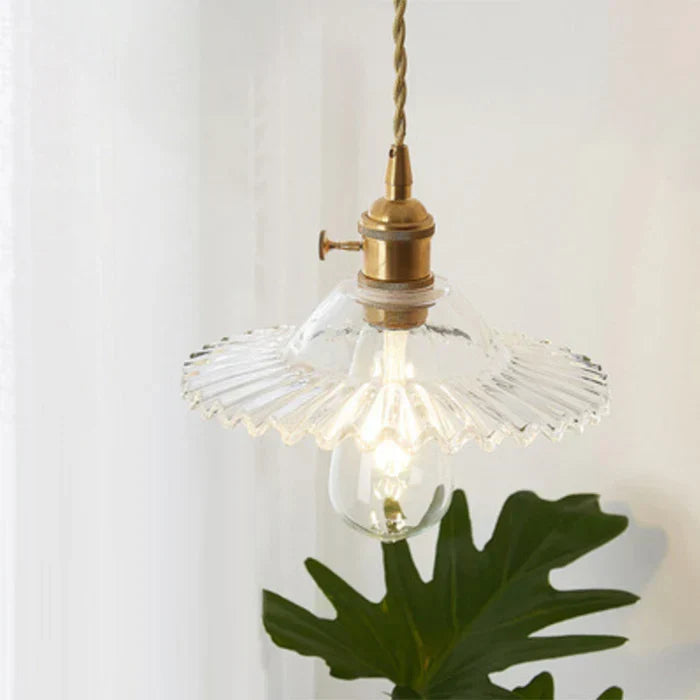 Modern transparent glass pendant lamp, ideal kitchen island lighting with elegant design.